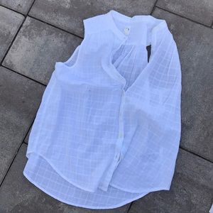 White sleeveless blouse